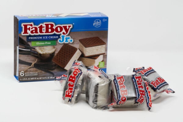 Packaged FatBoy gluten-free ice cream sandwiches beside their box