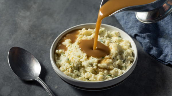 gluten-free gravy poured over mashed potatoes